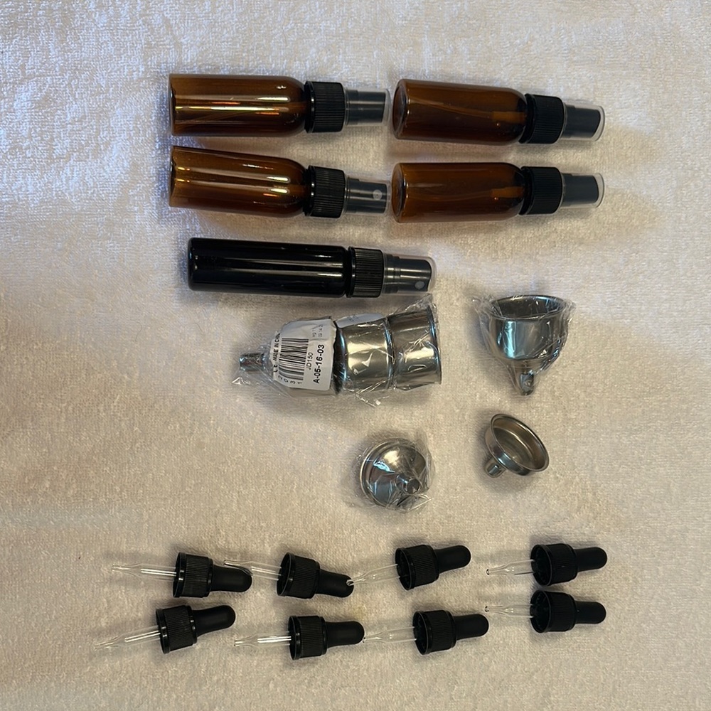 Amber and Black Spray Bottles with Accessories